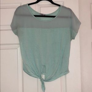 Top with tie at the bottom